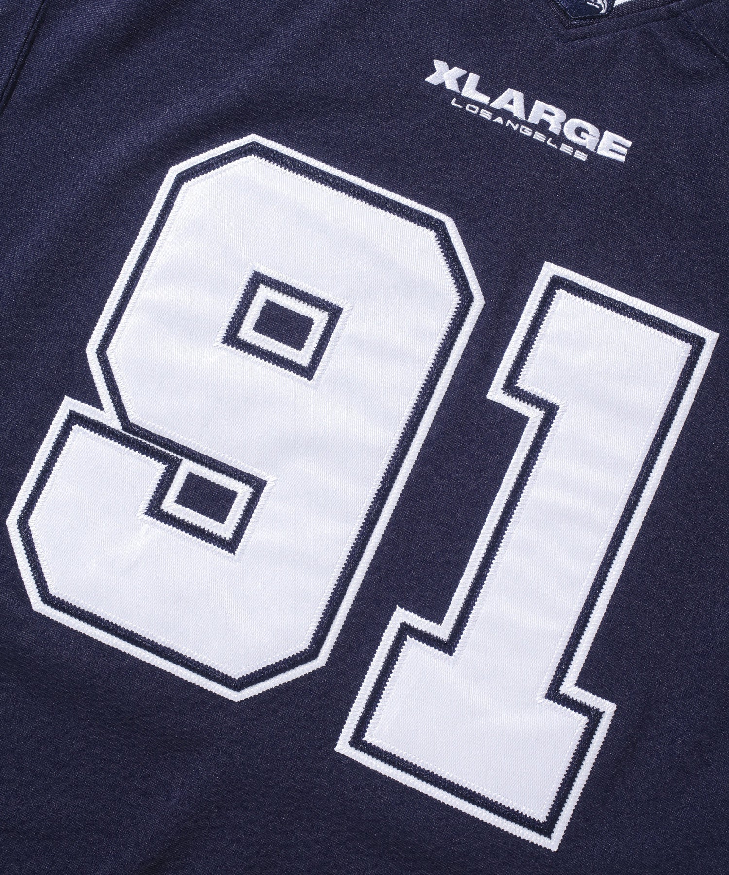 เสื้อยืดแขนสั้น XLARGE รุ่น PANELED FOOTBALL JERSEY