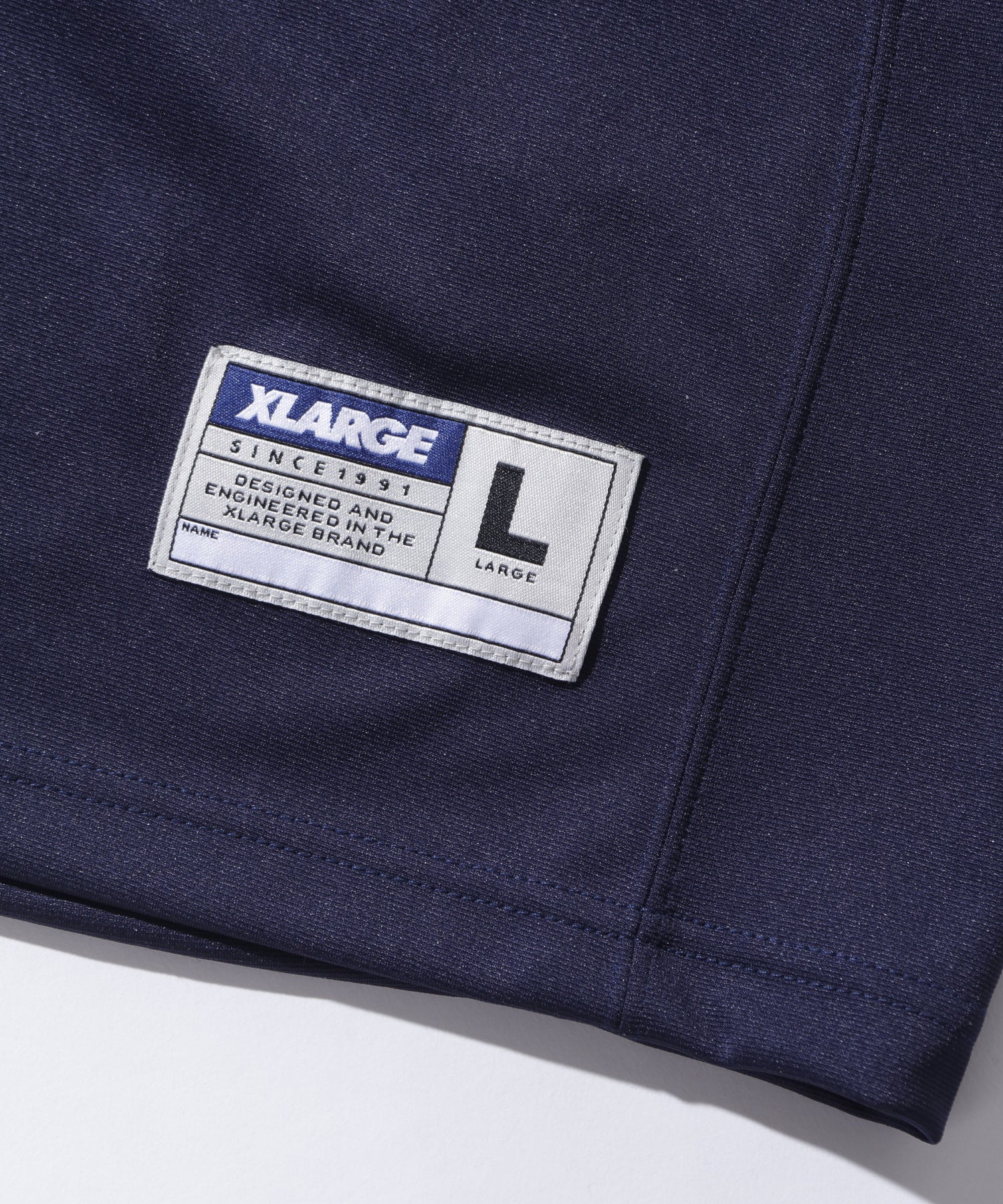 เสื้อยืดแขนสั้น XLARGE รุ่น PANELED FOOTBALL JERSEY