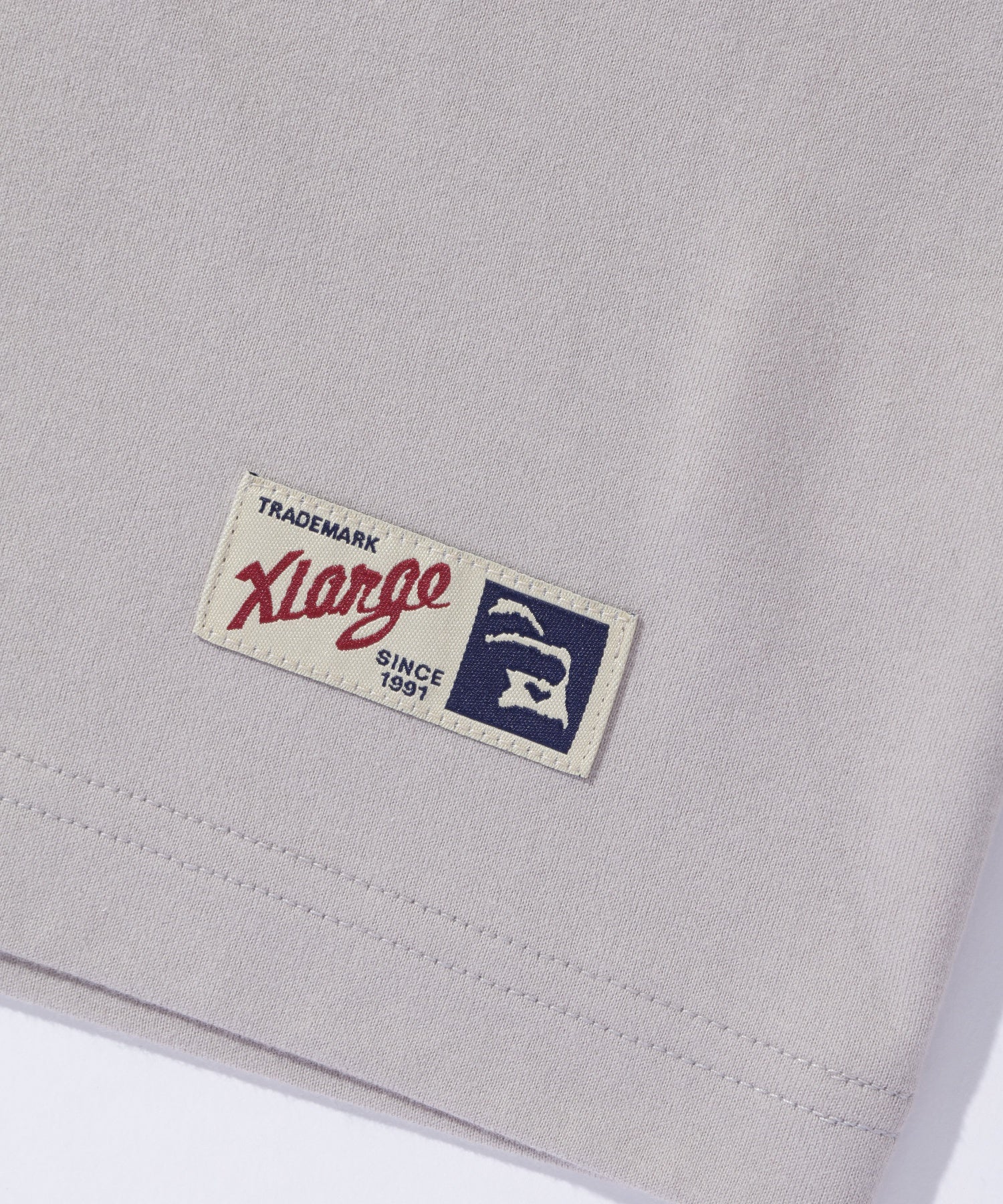 เสื้อยืดแขนสั้น XLARGE รุ่น Retro Script Logo Ringer S/S Tee