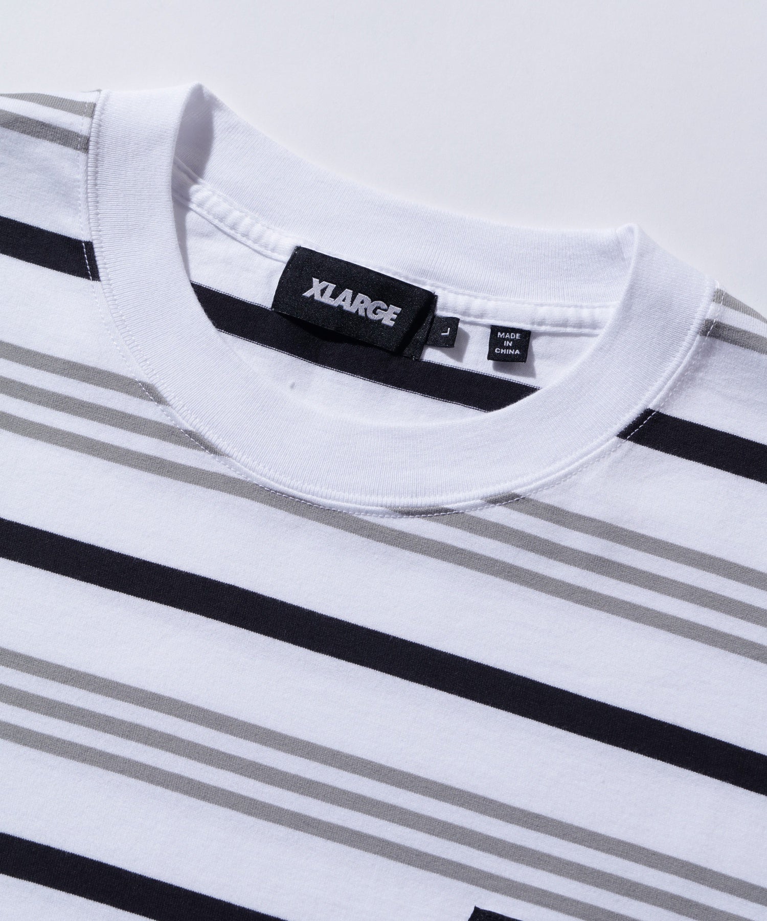 เสื้อยืดแขนสั้น XLARGE รุ่น STRIPE S/S TEE