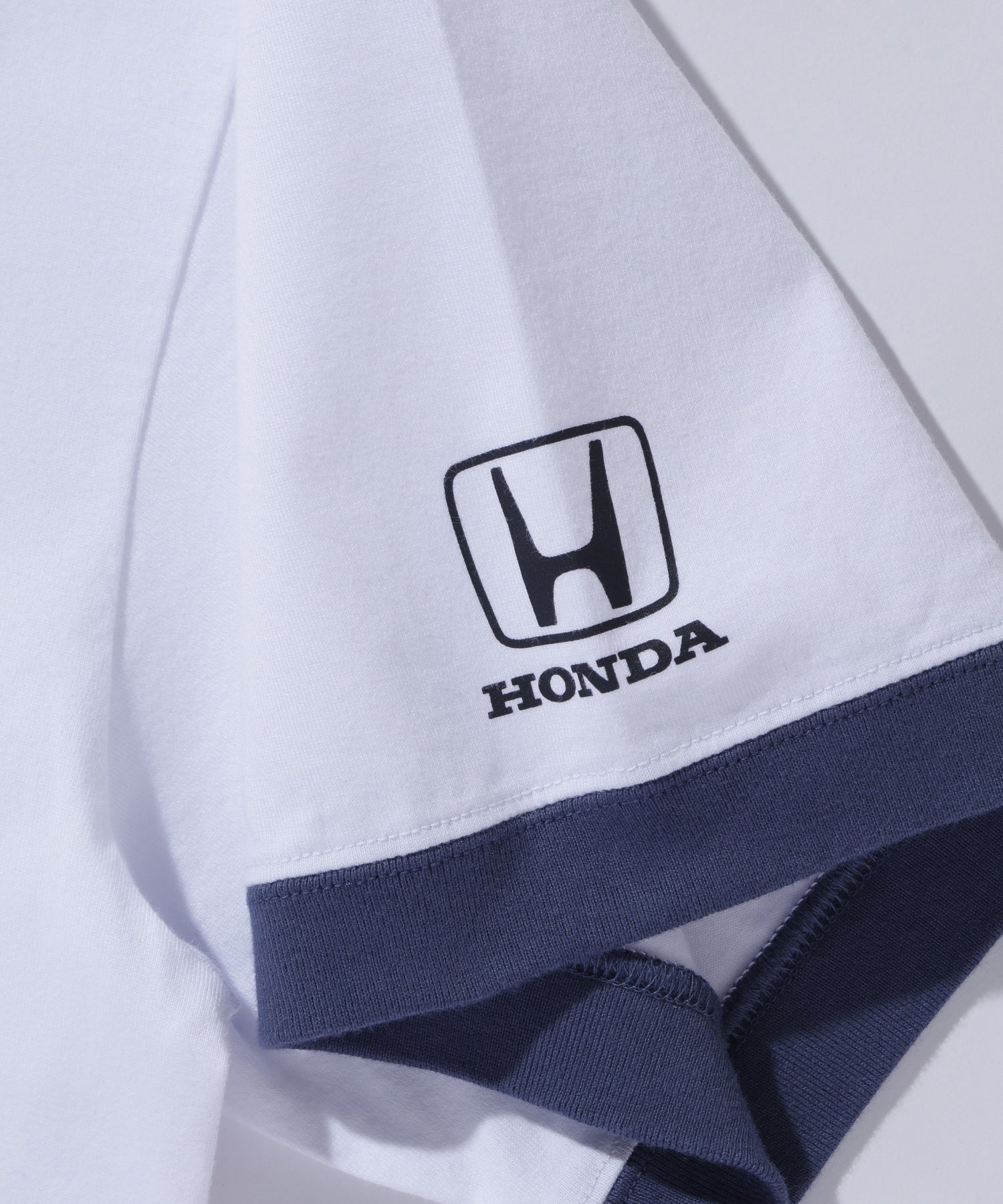 เสื้อยืดแขนสั้น XLARGE x Honda PARTS SUPPLIERS RINGER S/S TEE