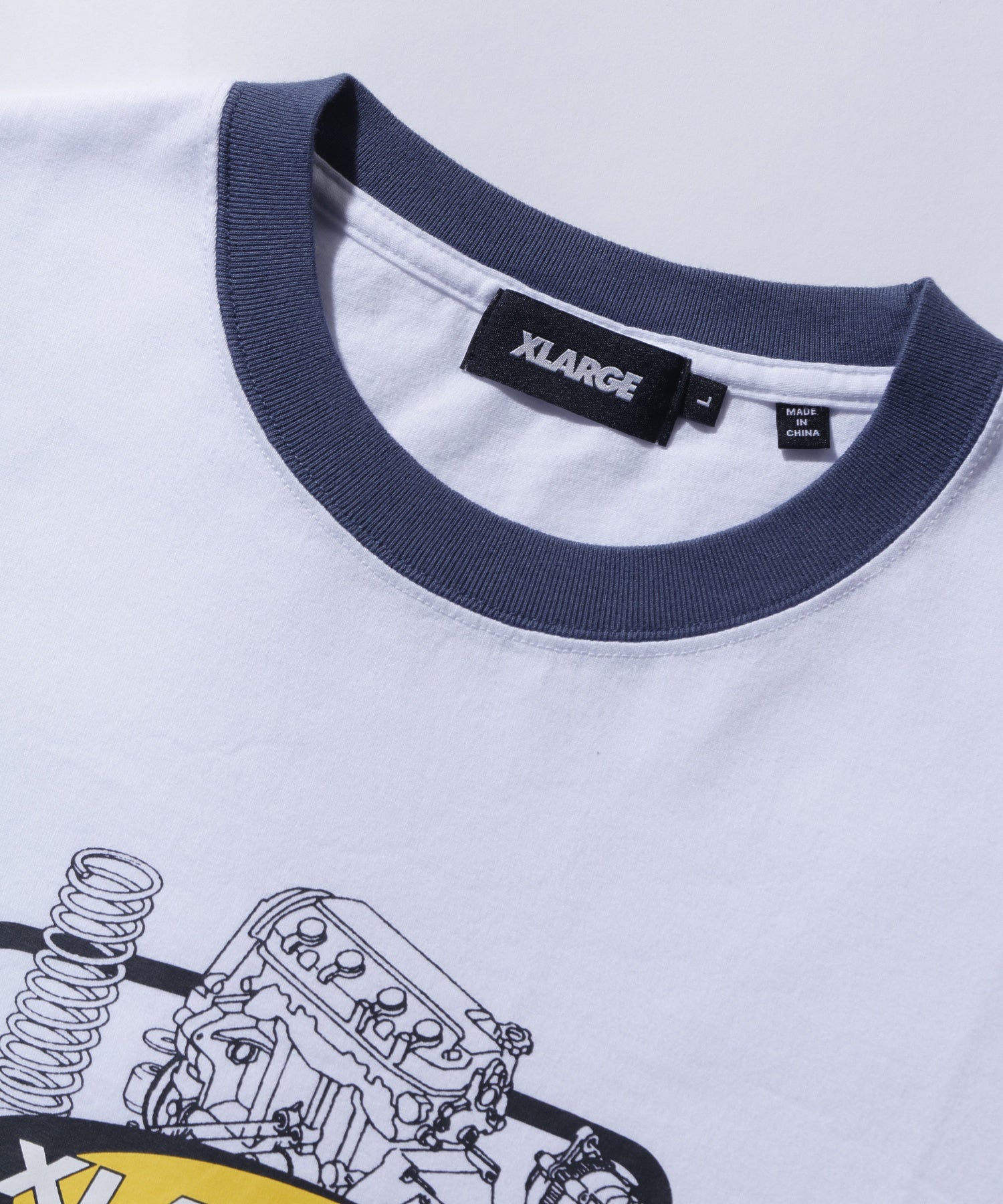 เสื้อยืดแขนสั้น XLARGE x Honda PARTS SUPPLIERS RINGER S/S TEE