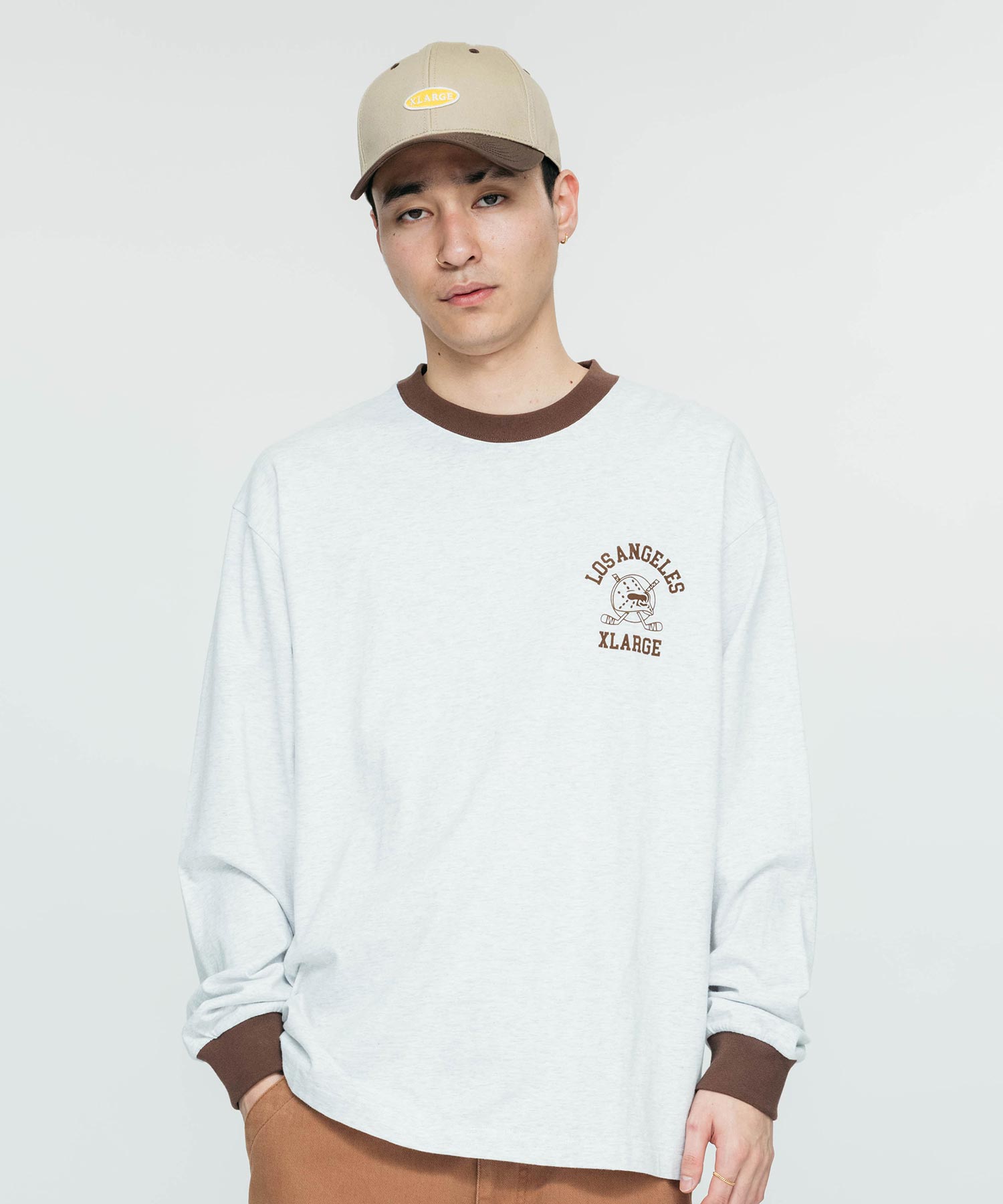 เสื้อยืดเเขนยาว XLARGE รุ่น Hockey Logo Ringer L/S Tee