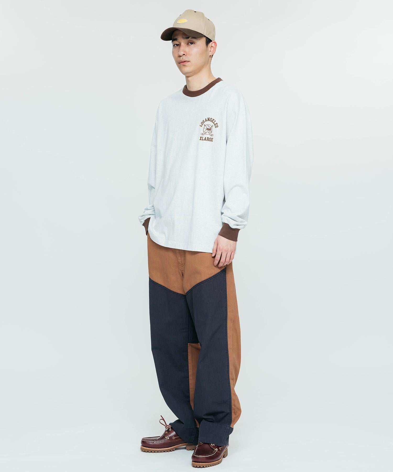 เสื้อยืดเเขนยาว XLARGE รุ่น Hockey Logo Ringer L/S Tee