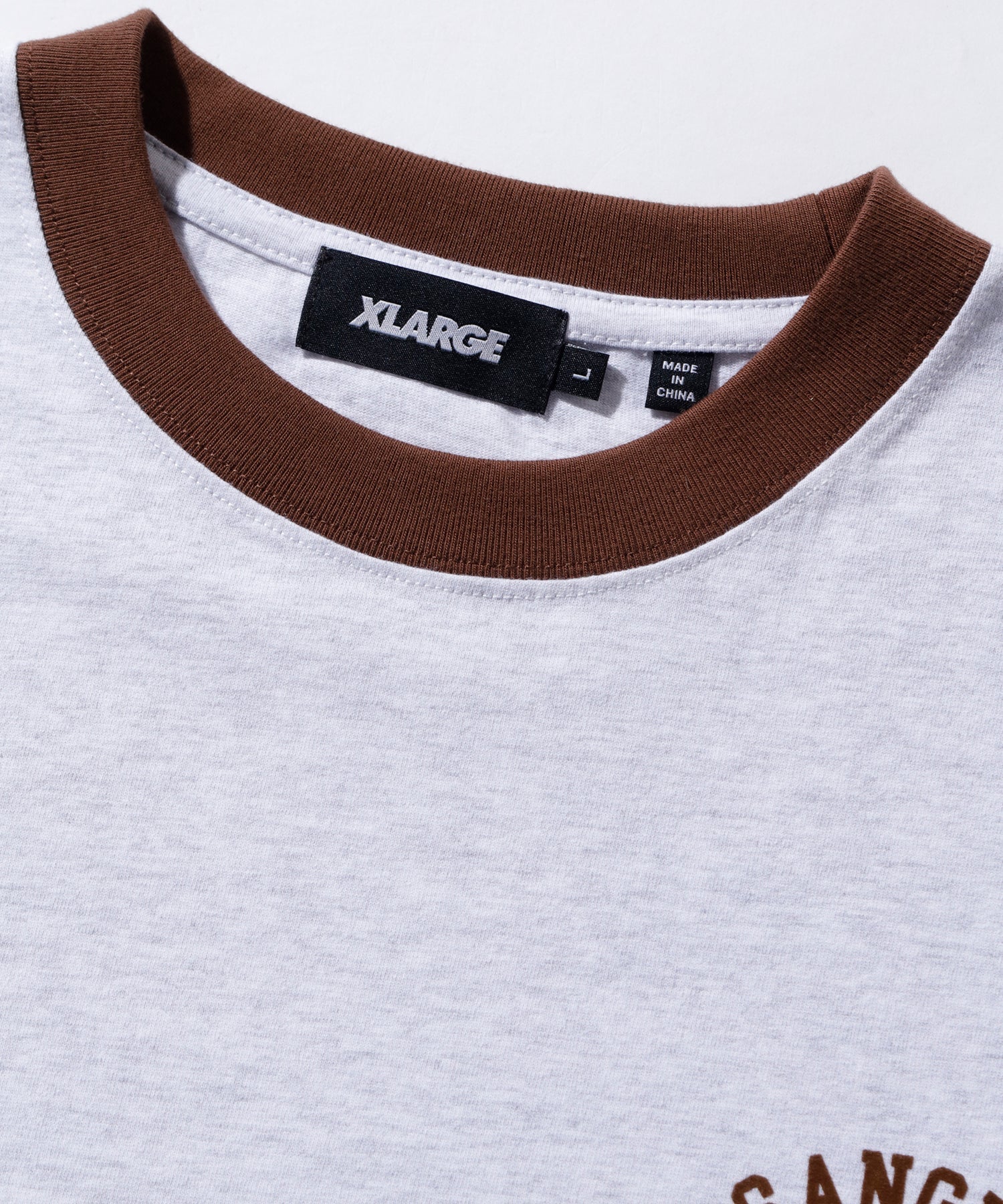 เสื้อยืดเเขนยาว XLARGE รุ่น Hockey Logo Ringer L/S Tee