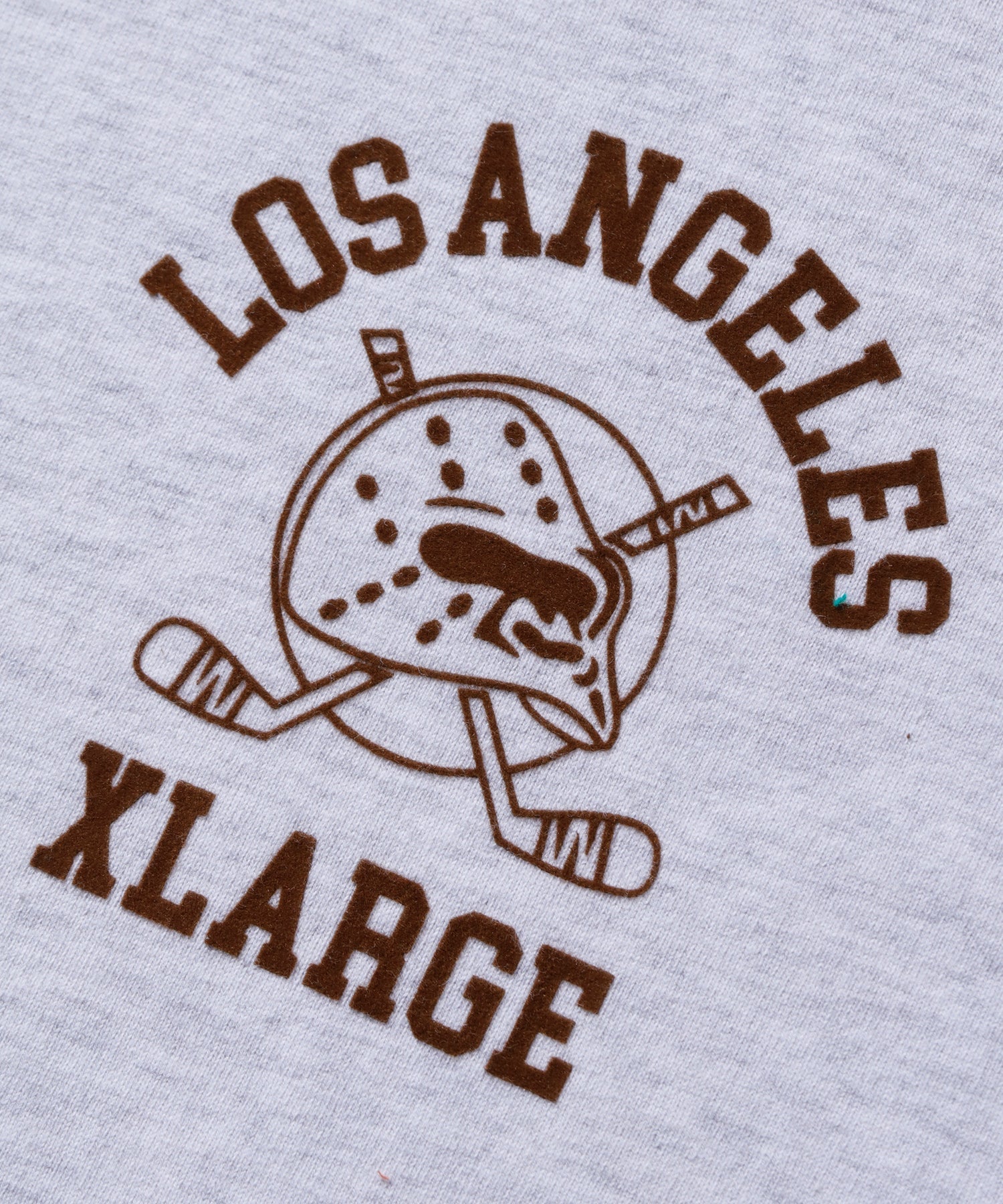 เสื้อยืดเเขนยาว XLARGE รุ่น Hockey Logo Ringer L/S Tee